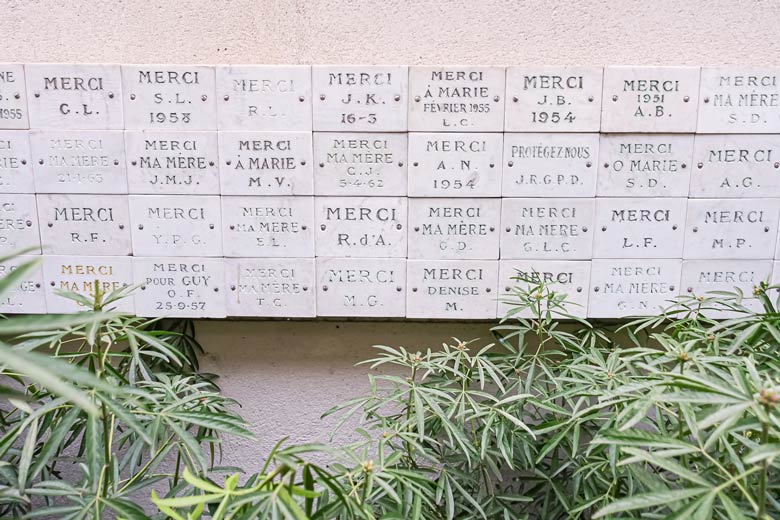 Ex-voto plaques at the Chapel of Our Lady of the Miraculous Medal